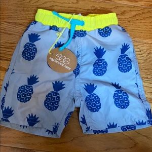 Susan Lazar Baby swim trunks brand new. 6mos